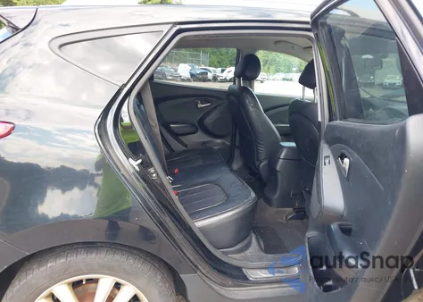 2010 Hyundai Tucson Limited z USA, uszkodzony, nr VIN KM8JUCAC0AU047182